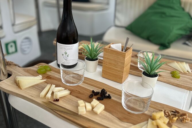 1h Boat Trip + 2h Dockside Local Wine & Food Tasting - Returning point views: see the coastline from a second perspective