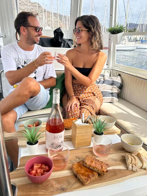 1h Boat Trip + 2h Dockside Wine & Food Tasting - Entering Puerto de Mogan by boat, not by bus