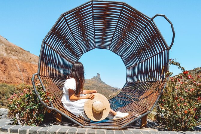 Excursion to the center of the island Gran Canaria - Fataga: palms and pine with traditional houses and a valley view