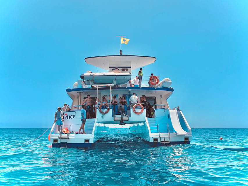 From Puerto Rico: Boat trip along the coast w/ Food & Drinks - Lunch, mojitos, and the calm-water bay stop
