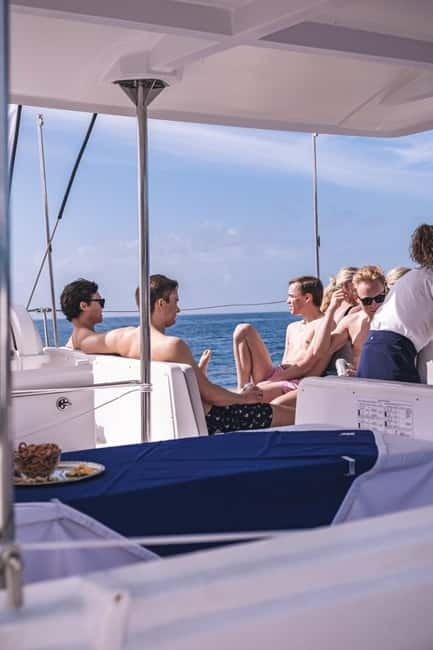 Gran Canaria: Catamaran Tour with Lunch on Pristine Beaches - Passing Playa de Tiritaña and the cliff-and-cave views en route
