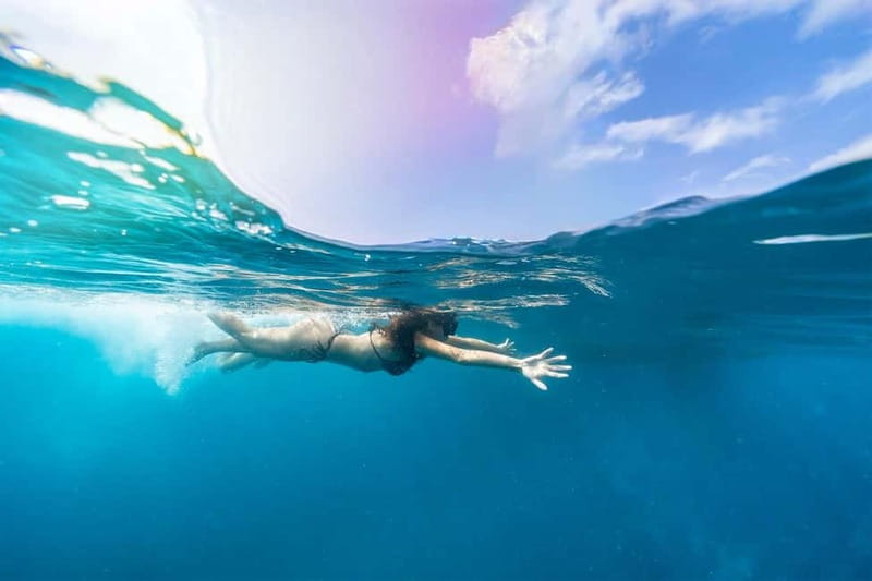 Gran Canaria: Catamaran Tour with Lunch on Pristine Beaches - Playa de Veneguera swim stop: your first real taste of clear water