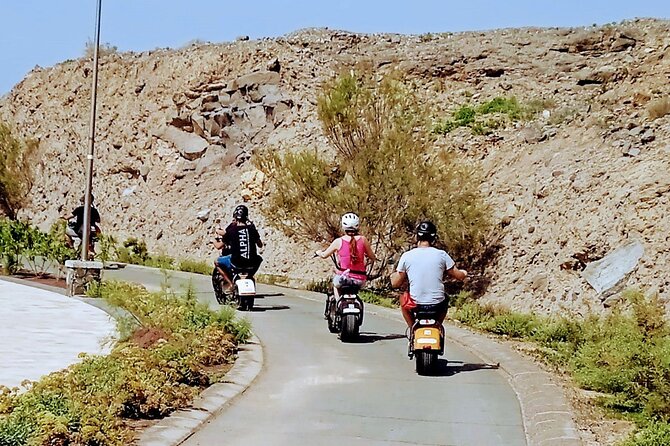 Maspalomas - Meloneras : e-Scooter 2 seat Sunset Guided Tour - Campo Internacional Pass-Through and the Green Pause