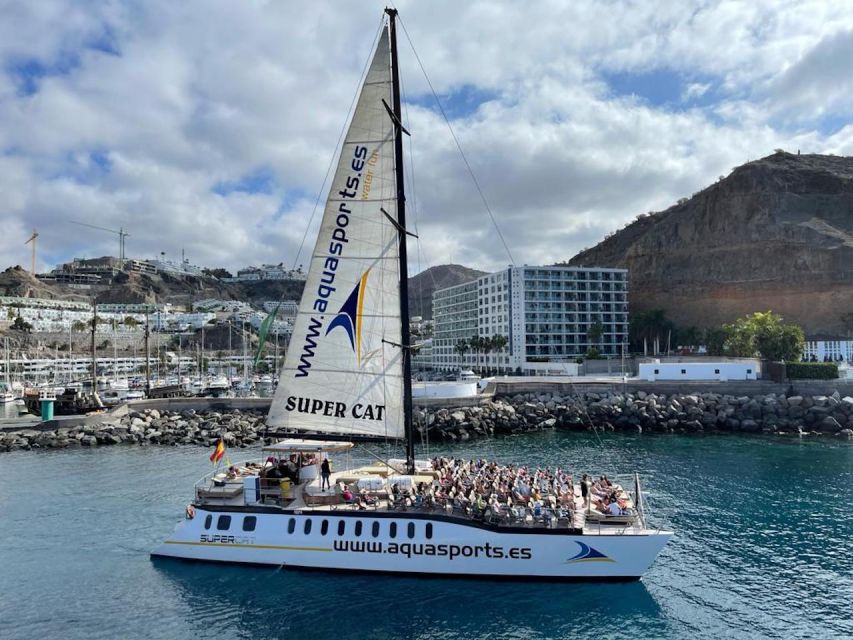Puerto Rico de Gran Canaria: Premium Dolphin Catamaran Tour - What is included on the water: snorkel gear and banana boat fun