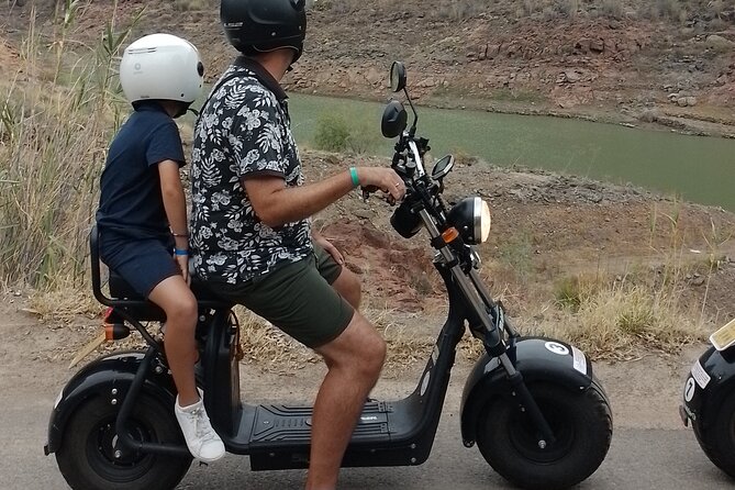 Rent e-Scooter 2 seater from 1 untill 4 Hour : Explore Maspalomas - Meloneras to the luxury stretch, then toward the dunes